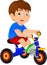 Funny little child on tricycle