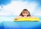 Funny little girl with diving glasses floating inflatable ring a