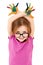 Funny little girl wearing glasses playing with water colors