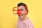 Funny man with clown nose and large glasses on background. April fool`s day