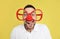 Funny man with clown nose and large glasses on background. April fool`s day