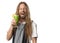 Funny man drinking green vegetable smoothie