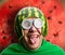 Funny man with watermelon helmet and googles