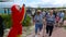 Funny mascot parrot,greeting with guests,Bahamas