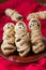 Funny meatballs sausage mummies in dough scary