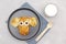 Funny monkey,dog face shape snack from pancake,cheese on plate. Cute kids childrens baby`s sweet dessert, healthy breakfast,lunch