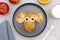 Funny monkey,dog face shape snack from pancake on plate. Cute kids childrens baby\\\'s sweet dessert, healthy food