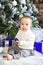 Funny one year old baby baby boy on bright festive background