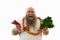 Funny overweigh man with a bunch of sausages around the neck holding sausages in one hand and greens on the other. Isolated on