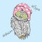 Funny owl in cosmetic mask and a towel. Bird with cucumber on her eyes.