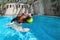 Funny photo of jack russell terrier in swimming pool