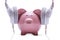 Funny piggy bank listening to stereo headphones