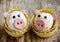 Funny pigs shaped snack tartlets stuffed with rice, surimi crab sticks, garlic and mayonnaise