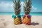 Funny pineapples with sunglasses on the sand beach against turquoise sea