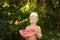 Funny playful boy eating watermelon, smile. outdoors portrait