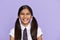 Funny positive indian kid primary school girl laughing  on background.