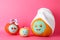 Funny pumpkins on pink background