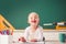 Funny Pupil in classroom. Back to school. Funny School kids. Fun and happy child concept.