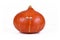 Funny `Red Kuri` squash, also called `Hokkaido` squash, with googly eyes on white background