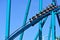 Funny riders enjoying downhill with their hands up in Mako Roller Coaster at Seaworld Theme Par