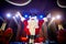 Funny Santa DJ mixes in the beams of light music.