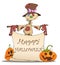 Funny scarecrow, pumpkins and Halloween