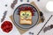 Funny scary monster face smile on halloween sandwich toast bread with peanut butter, blueberry, raspberry on plate,bats