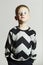 Funny shock face child in sweater.children trend.little boy.emotion