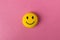 Funny smiley face on pink background. Positive mood. Empty text space