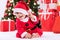 Funny smiling baby santa claus