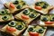 Funny smiling sandwiches with face from cucumbers, tomato, olive and dill