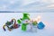 Funny snowman with sledge, colorful candies, gift box and sparklers. Happy new year 2020. Christmas composition with snowy.
