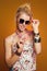 Funny teenager girl in sunglasses