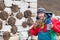 Funny tourist eating yak cow dung.