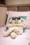 Funny towel folding with glasses on the bed for kids` cabin