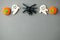 Funny toy pumpkins, ghost, bat from plasticine molded children. Scary Halloween background with open space for text. Banner.