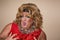 Funny travesty actor. Drag queen in red