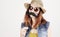 Funny trendy hipster girl with paper mustache playing with emotion