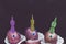 Funny unicorn faces from eggs colored in cosmic space paint. Easter. Copyspace