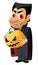 Funny vampire holds Halloween pumpkin.