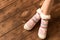 Funny warm socks on the little girl`s feet