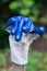 Funny waving garden glove close up bright blue