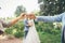 Funny wedding photo with blurred newlyweds and rings