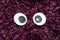 Funny Wiggle Google Eyes on Fabric Background