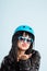 Funny woman wearing cycling helmet portrait real people high def