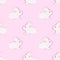 Funny wooden Easter Bunny seamless pattern on light pink background.