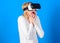 Funny young woman with VR. 3d technology, virtual reality, entertainment, cyberspace and people concept - happy young