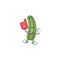 Funny zucchini mascot cartoon style with Foam finger