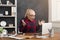 Furious woman working on laptop at office