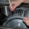 Furnace fan blades cleaned with soapy water.